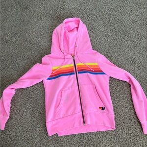 Pink Zip-Up Hoodie with Rainbow Stripes